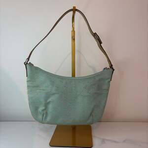 Gucci Light Blue GG Monogram Canvas Slim Pochette Shoulder Bag